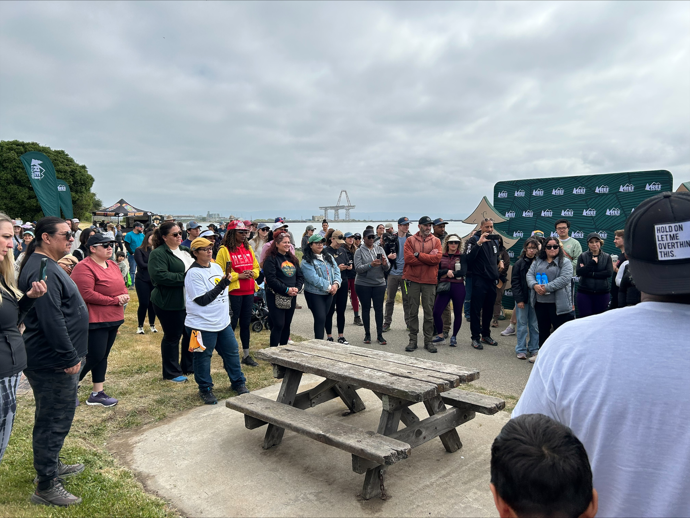 group of people listening to a speaker